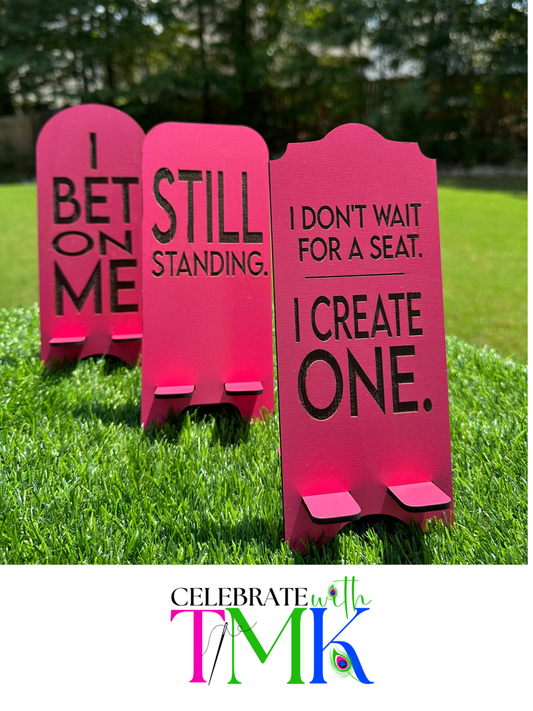 Set of three Statement Stand motivational phone holders in pink — "I Bet On Me," "Still Standing," and "I Don't Wait For A Seat, I Create One" — handmade MDF desk decor, Tailor Made Keepsakes
